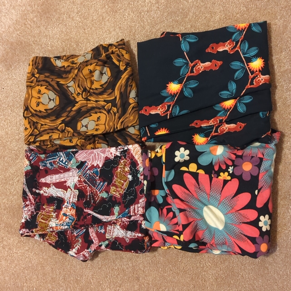4 LuLaRoe OS leggings Lion, Cities, Monkey, Daisy .